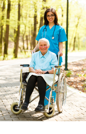 caregiver assisting old woman on the wheelchair