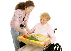 lady giving food to elder woman